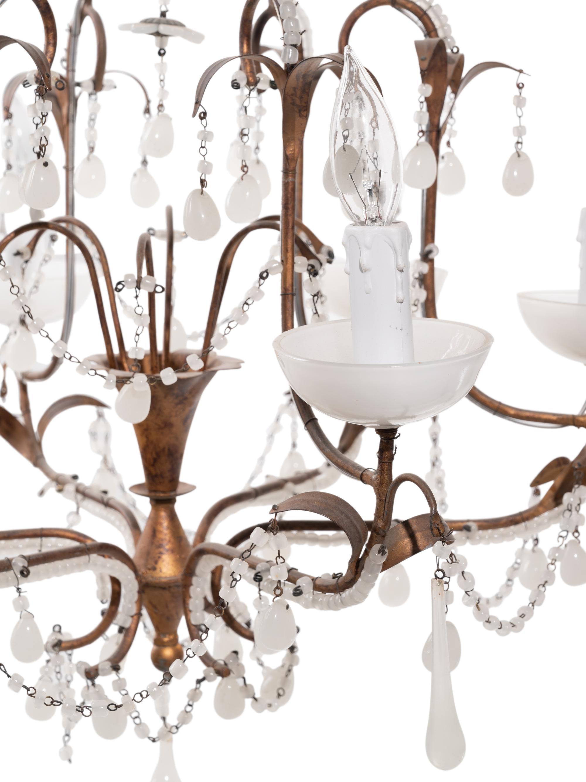 A Continental Gilt Metal and Opaline Glass Six-Light Chandelier