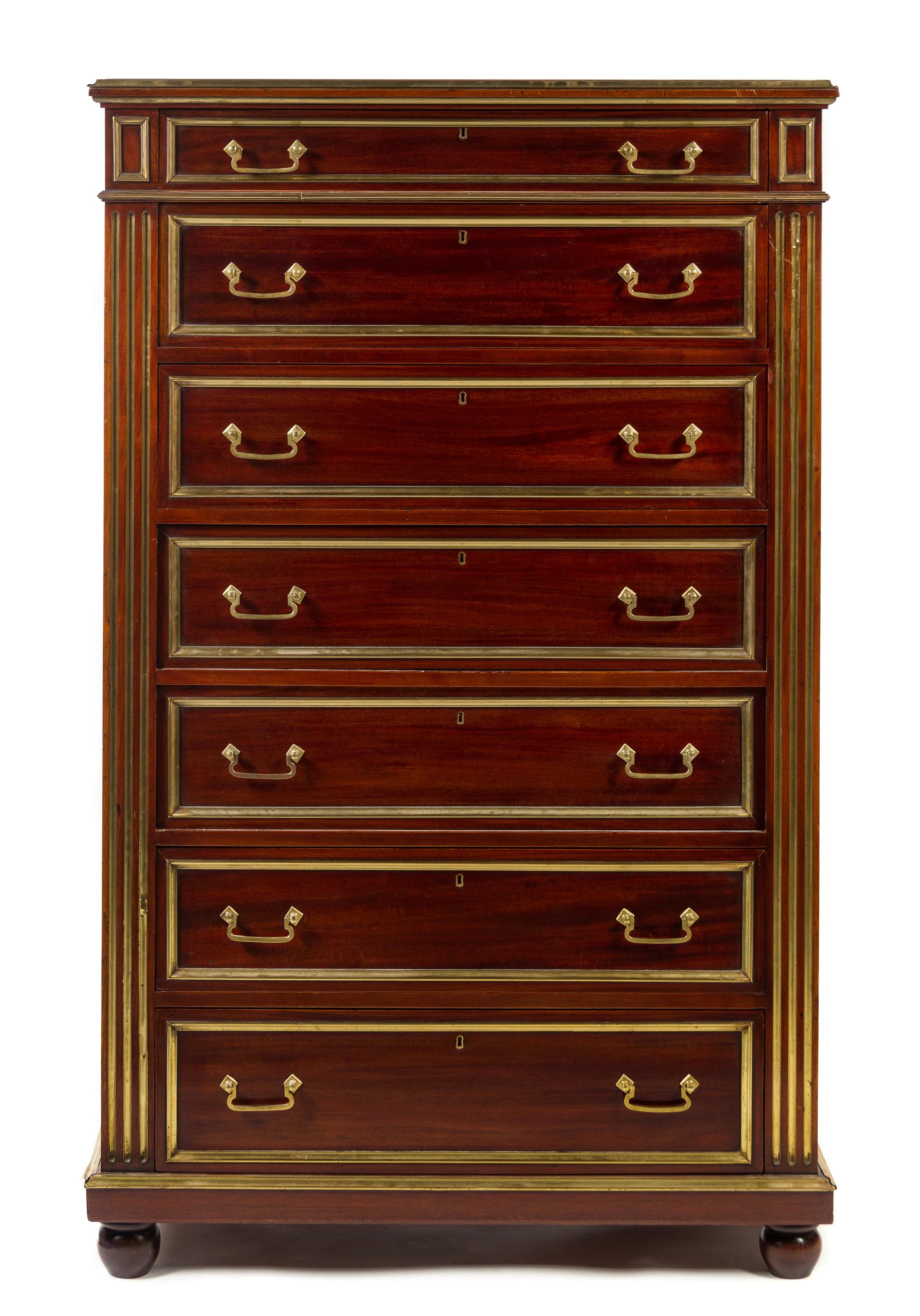 An R.J. Horner Directoire Style Brass Banded Mahogany Semainier Height 58 x width 36 x depth 19 3/4 inches.