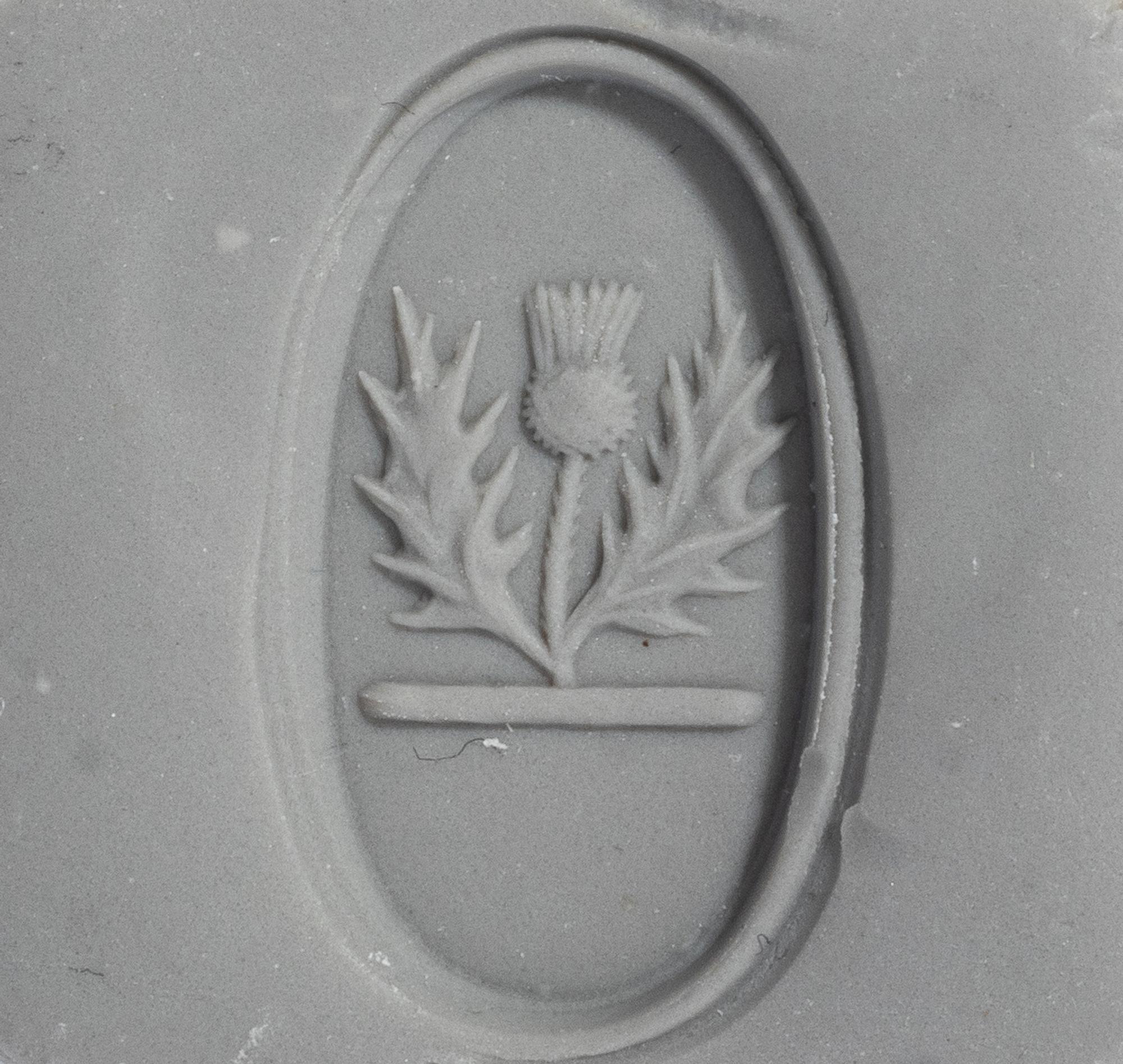 A Neoclassical Gold and Red Jasper Finger Ring with a Thistle