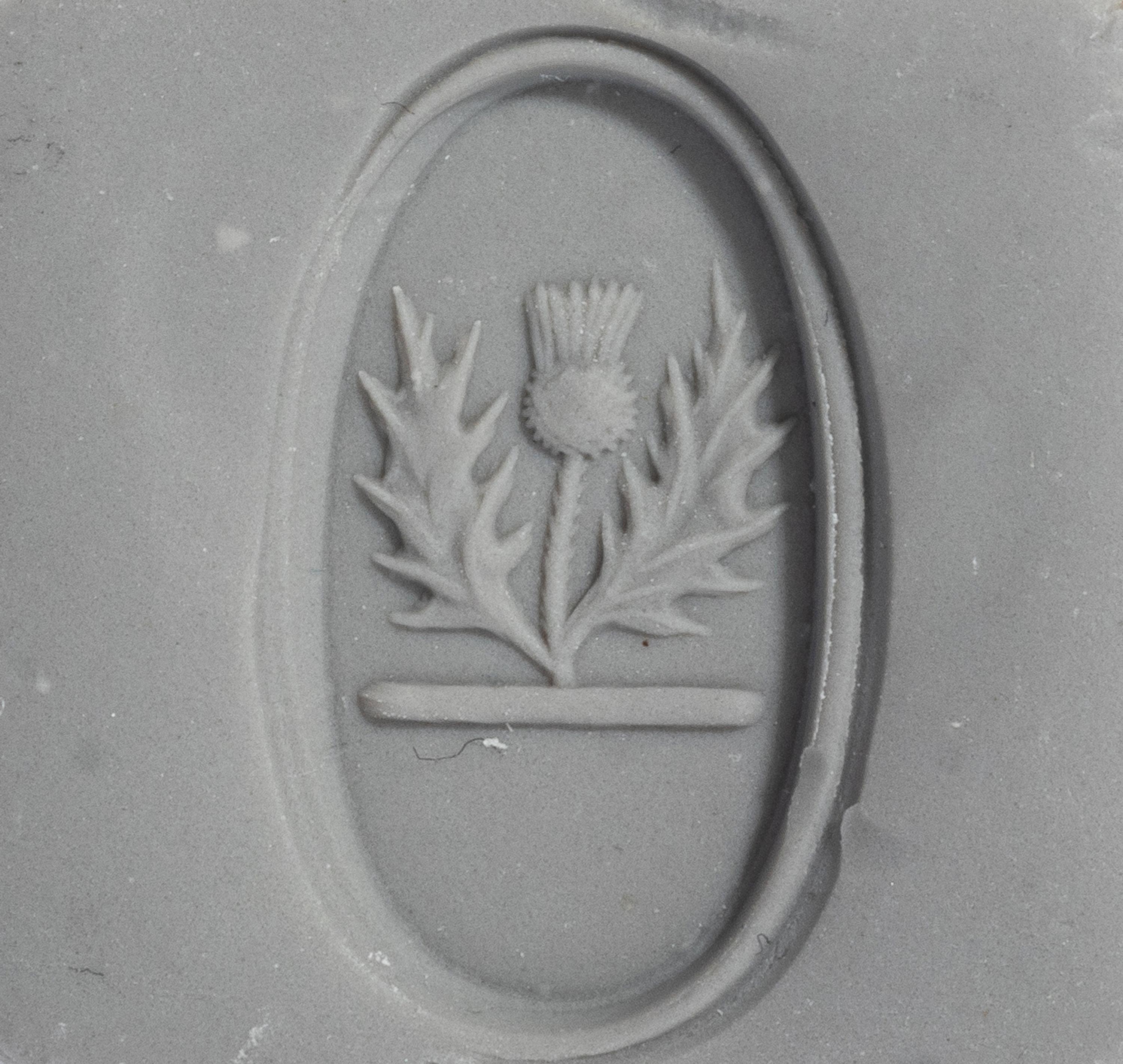A Neoclassical Gold and Red Jasper Finger Ring with a Thistle