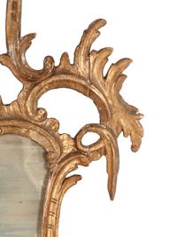 An Italian Baroque Style Giltwood Mirror