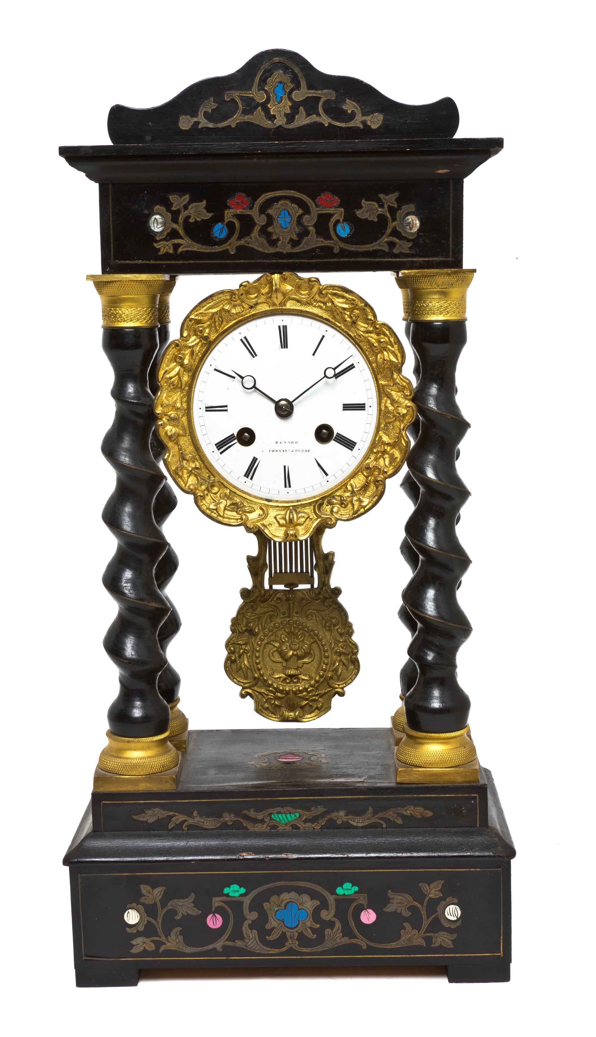 A Napoleon III Style Ebonized and Brass Inlaid Portico Clock, P. Marti et Cie, Height 17 3/4 inches.