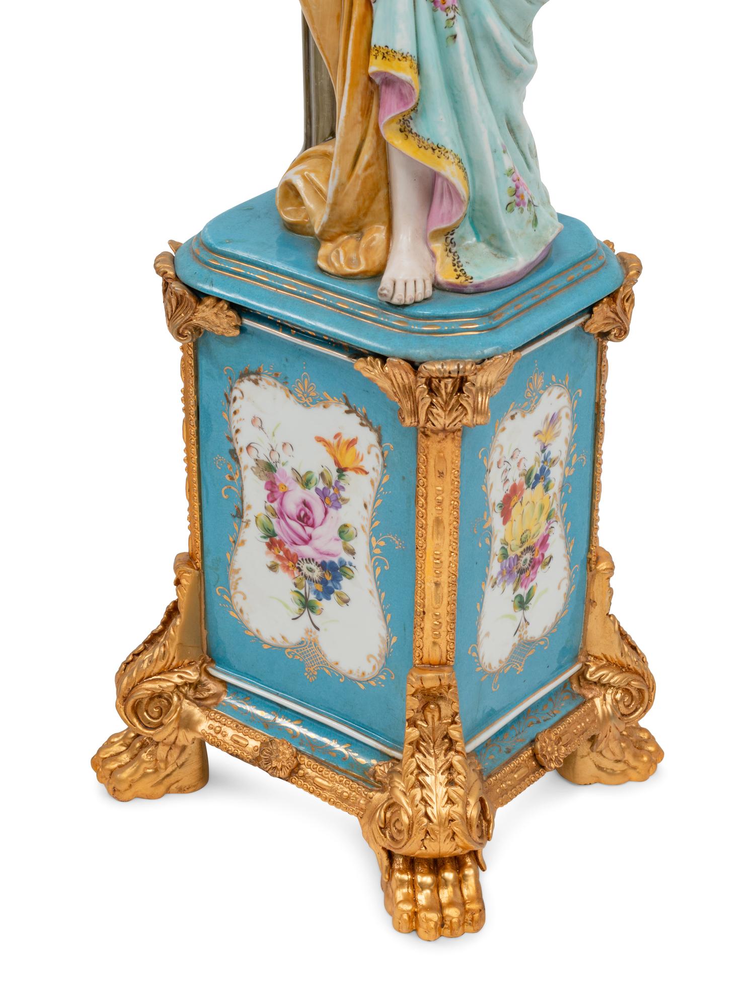 A Pair of German Porcelain and Gilt Bronze Figural Seven-Light Candelabra