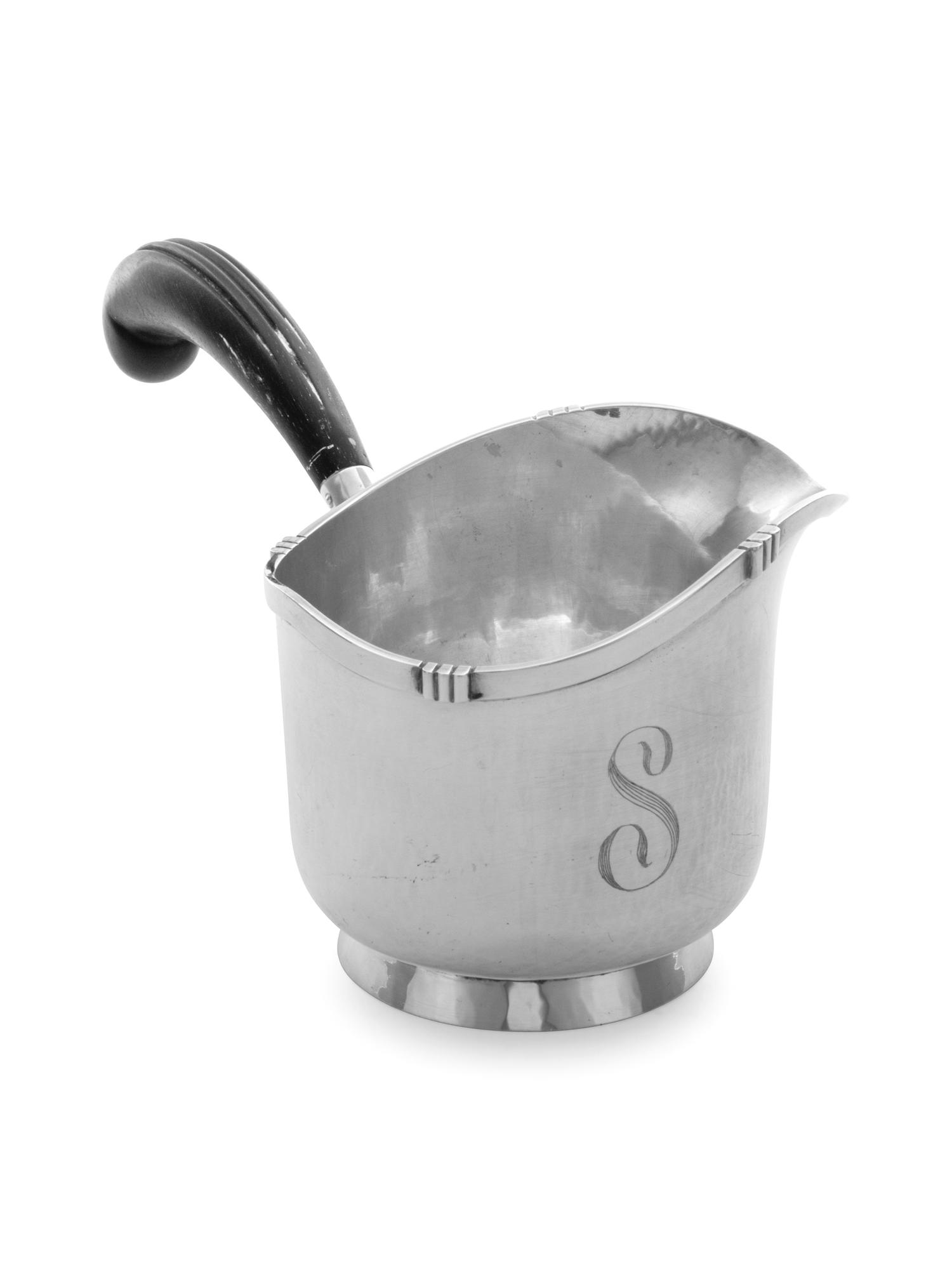 An American Arts and Crafts Silver Brandy Warmer