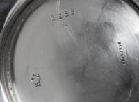 An American Silver Small Pitcher, Frank W. Smith Silver Co., Gardner, MA, of baluster form with a paneled lower body.