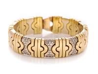 A Bicolor Gold and Diamond Cuff Bracelet,