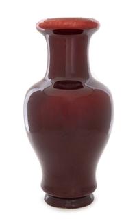 A Sang-de-Boeuf Glazed Porcelain Vase Height 16 3/4 inches.