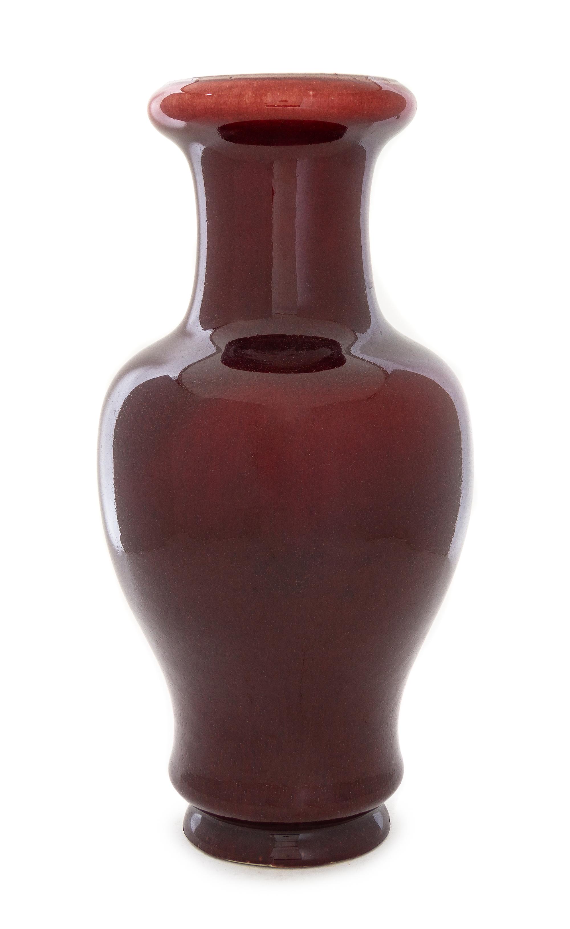 A Sang-de-Boeuf Glazed Porcelain Vase Height 16 3/4 inches.
