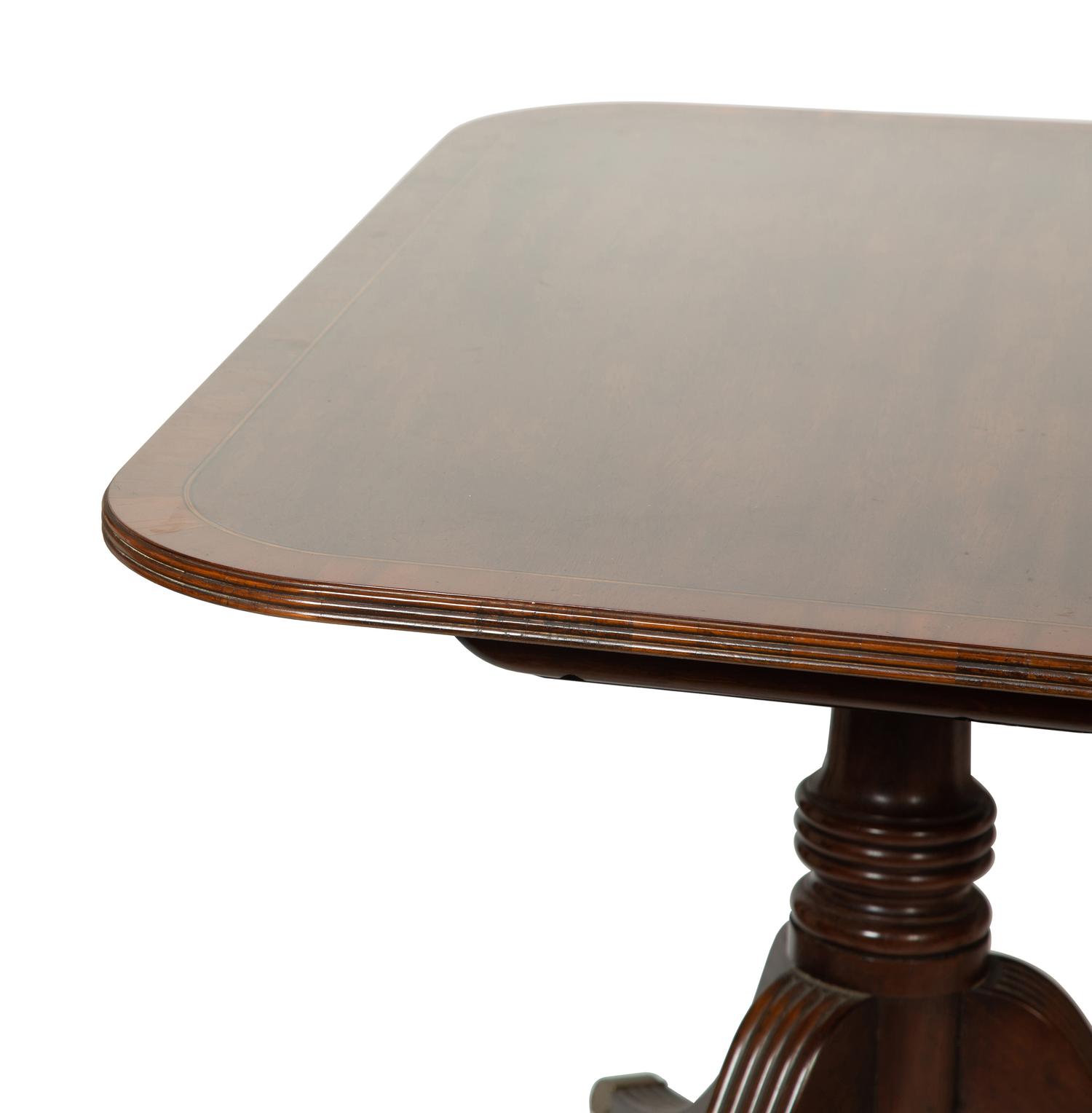 A Baker George III Style Mahogany Double-Pedestal Dining Table