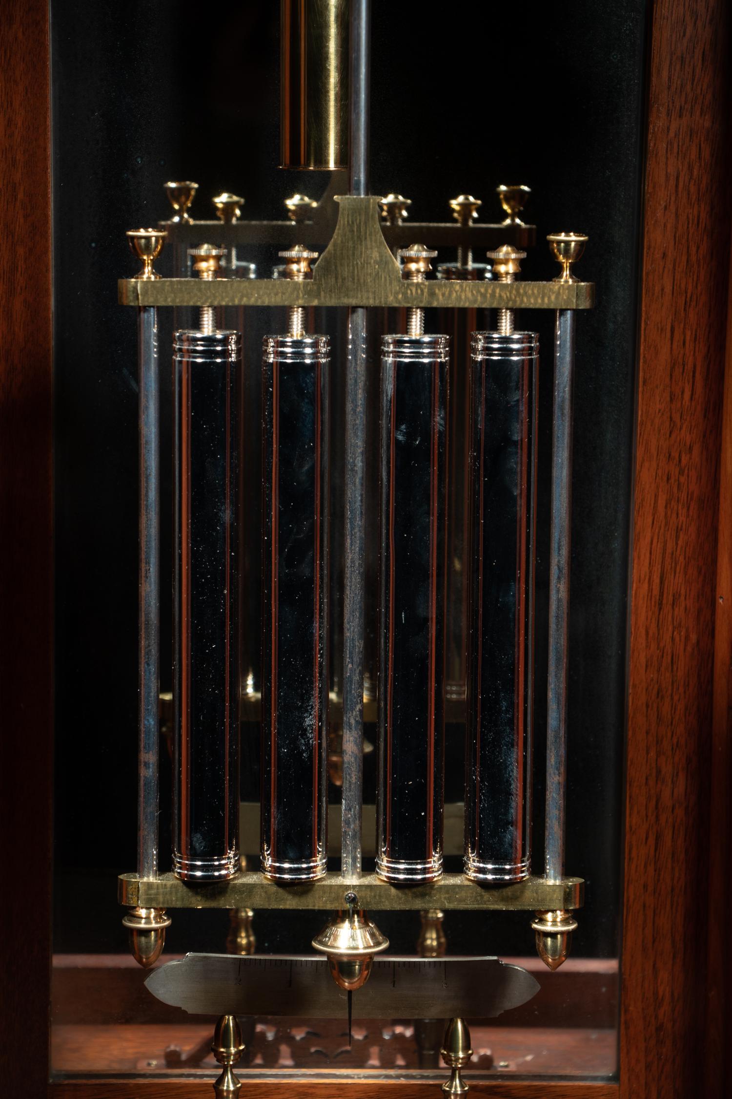 A Gothic Revival Carved Mahogany Tall Case No. 24 Astronomical Regulator