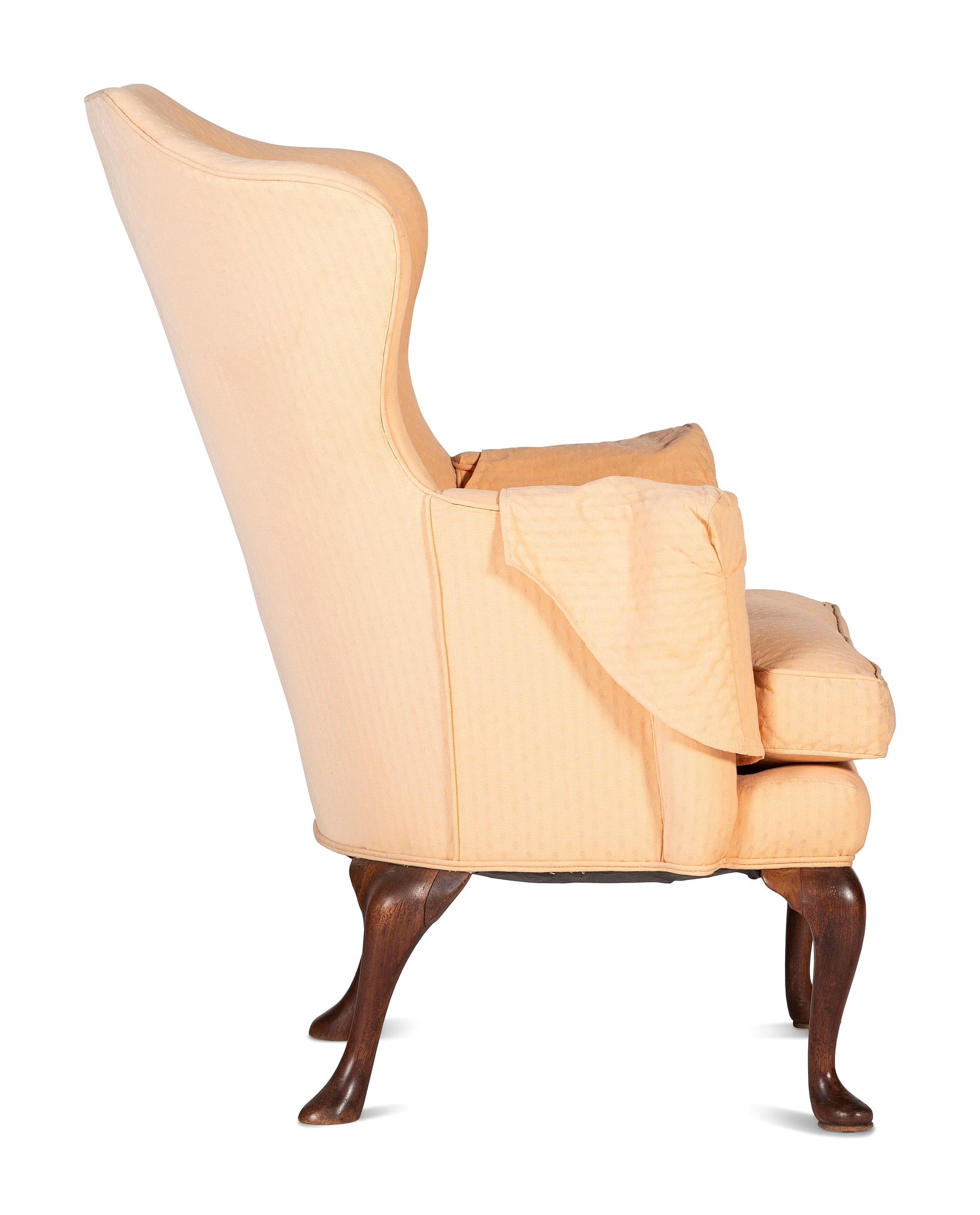A Queen Anne Style Carved Walnut Upholstered Easy Chair