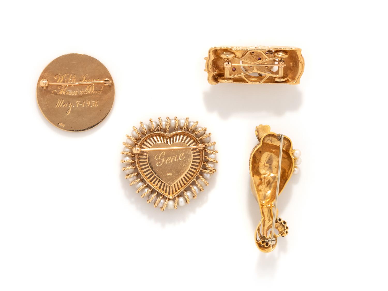COLLECTION OF YELLOW GOLD BROOCHES