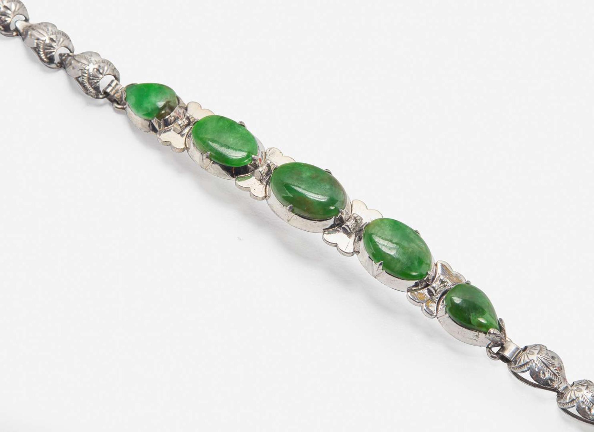 A Three-Piece Jade Jewelry Suite