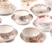 A Large Collection of English Porcelain Teacups and Saucers
