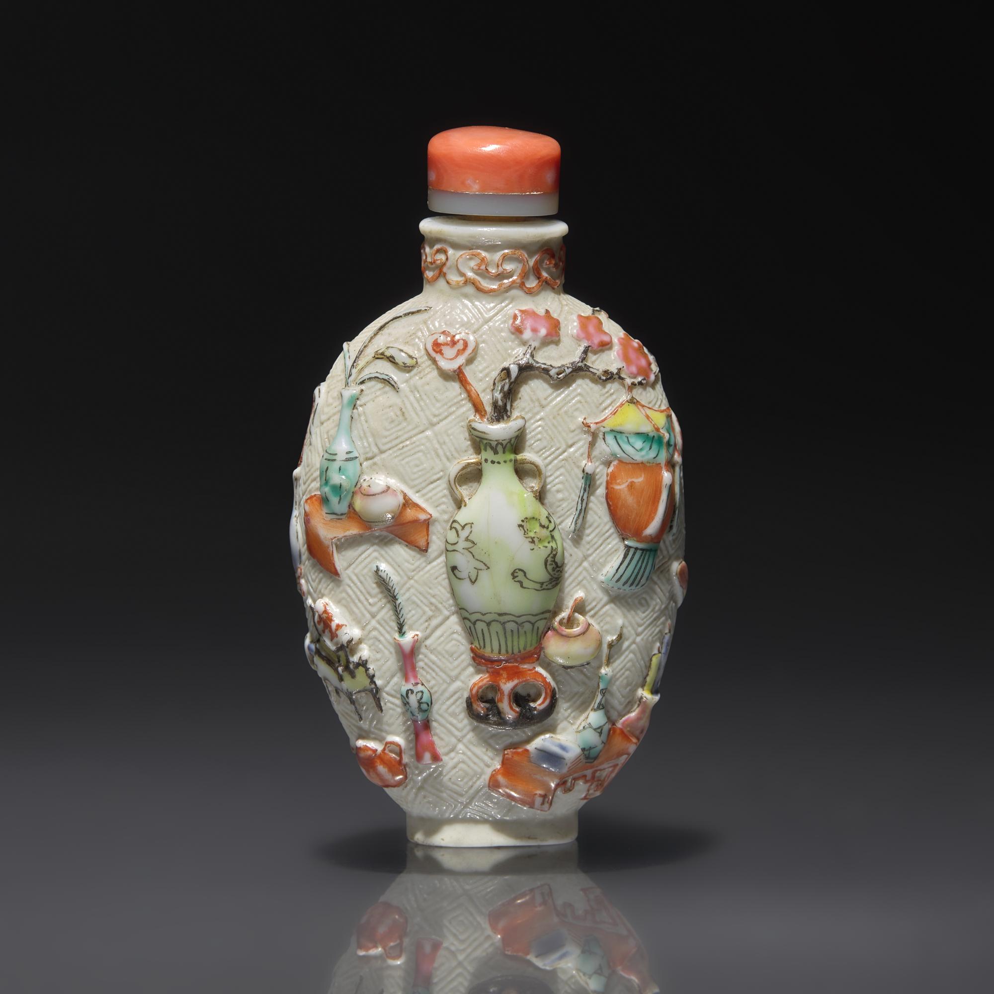 A Chinese Molded and Enameled "Bo Gu Tu" Porcelain Snuff Bottle, Qianlong Mark and of the Period — 1736-1795年 粉彩模印博古圖鼻煙壺