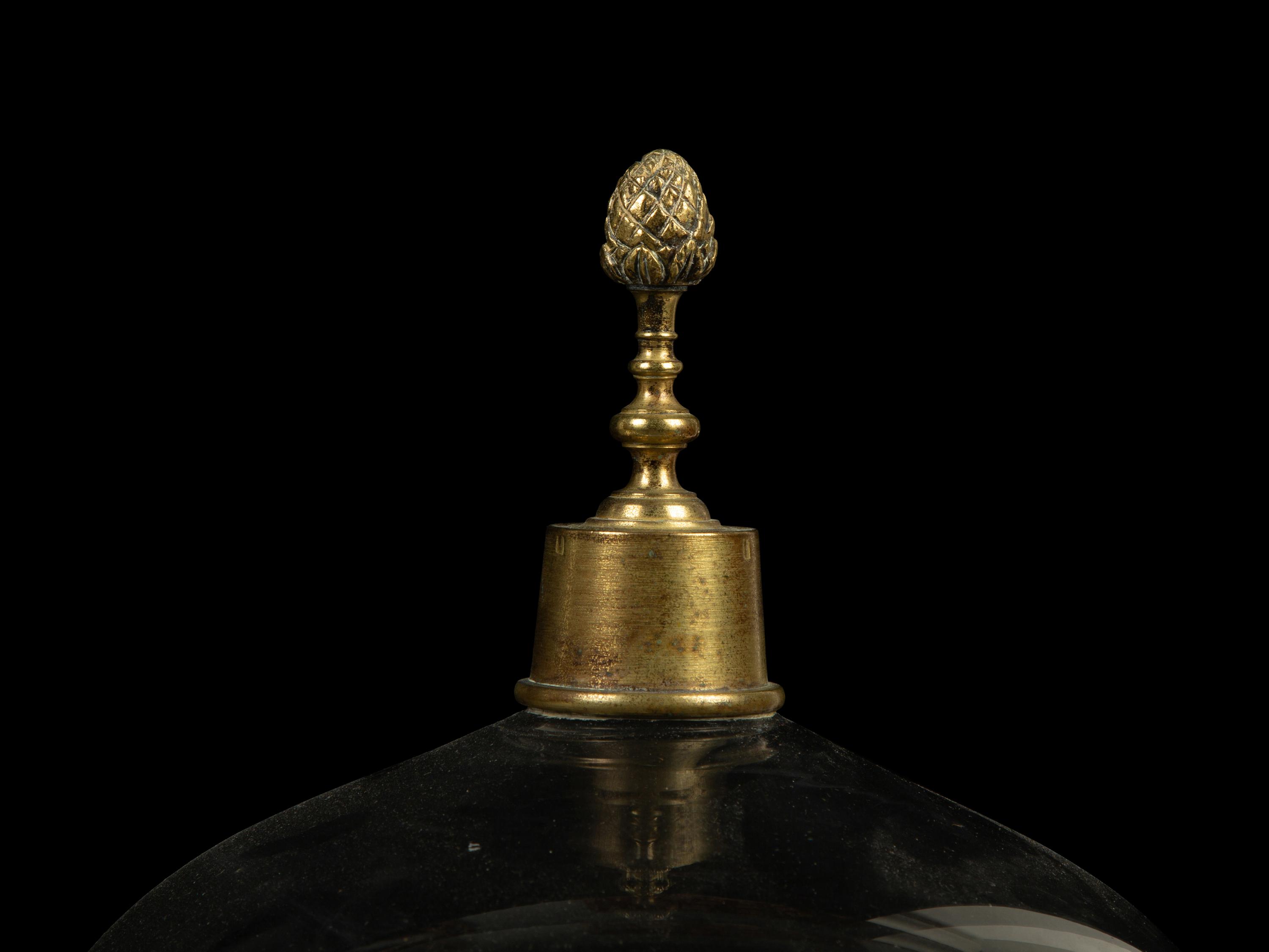A Near Pair of English Gilt Metal Mounted Glass Cloches — 19TH CENTURY