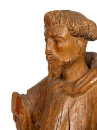 A Continental Carved Santos Figure