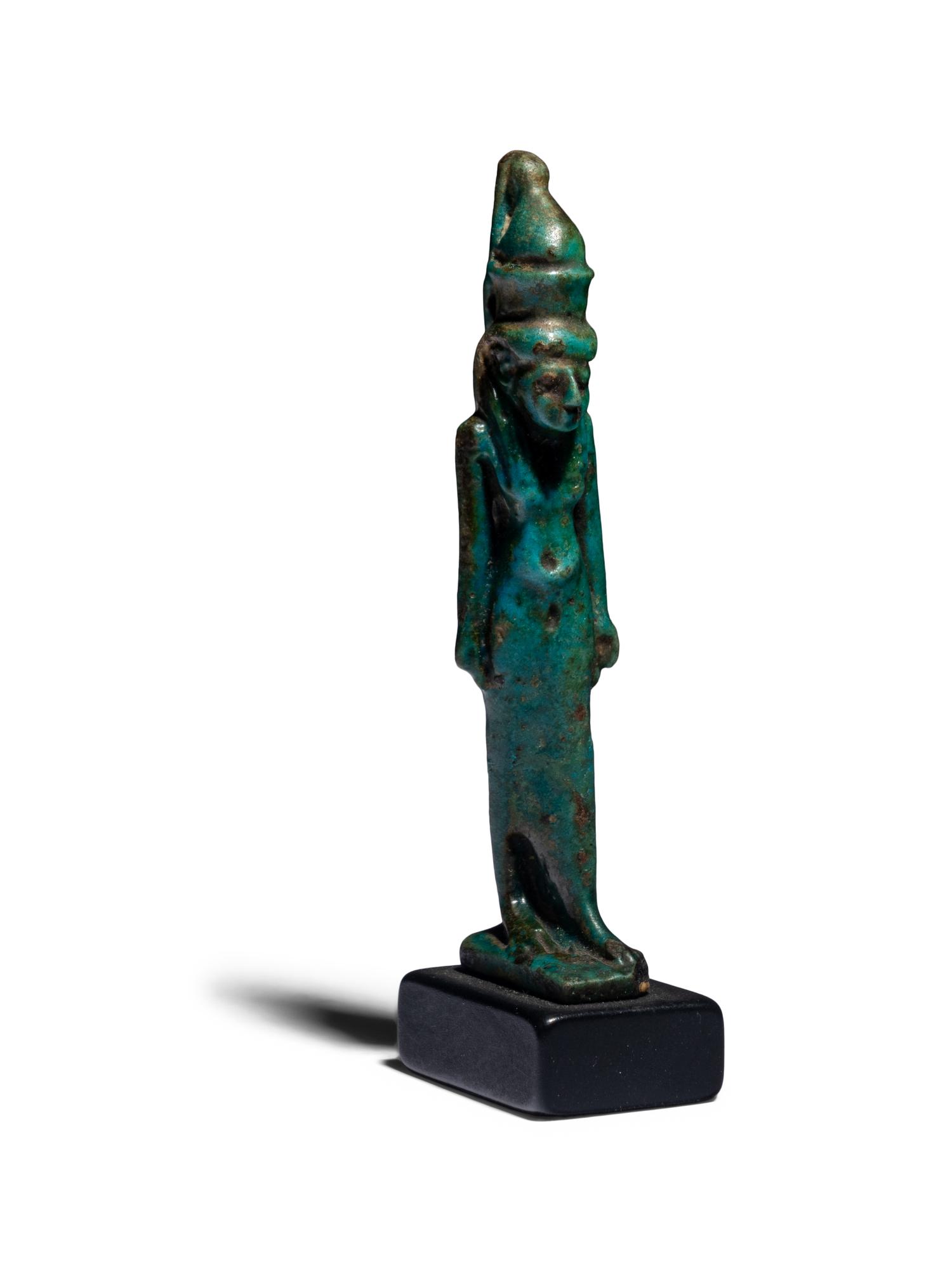 An Egyptian Faience Mut Amulet