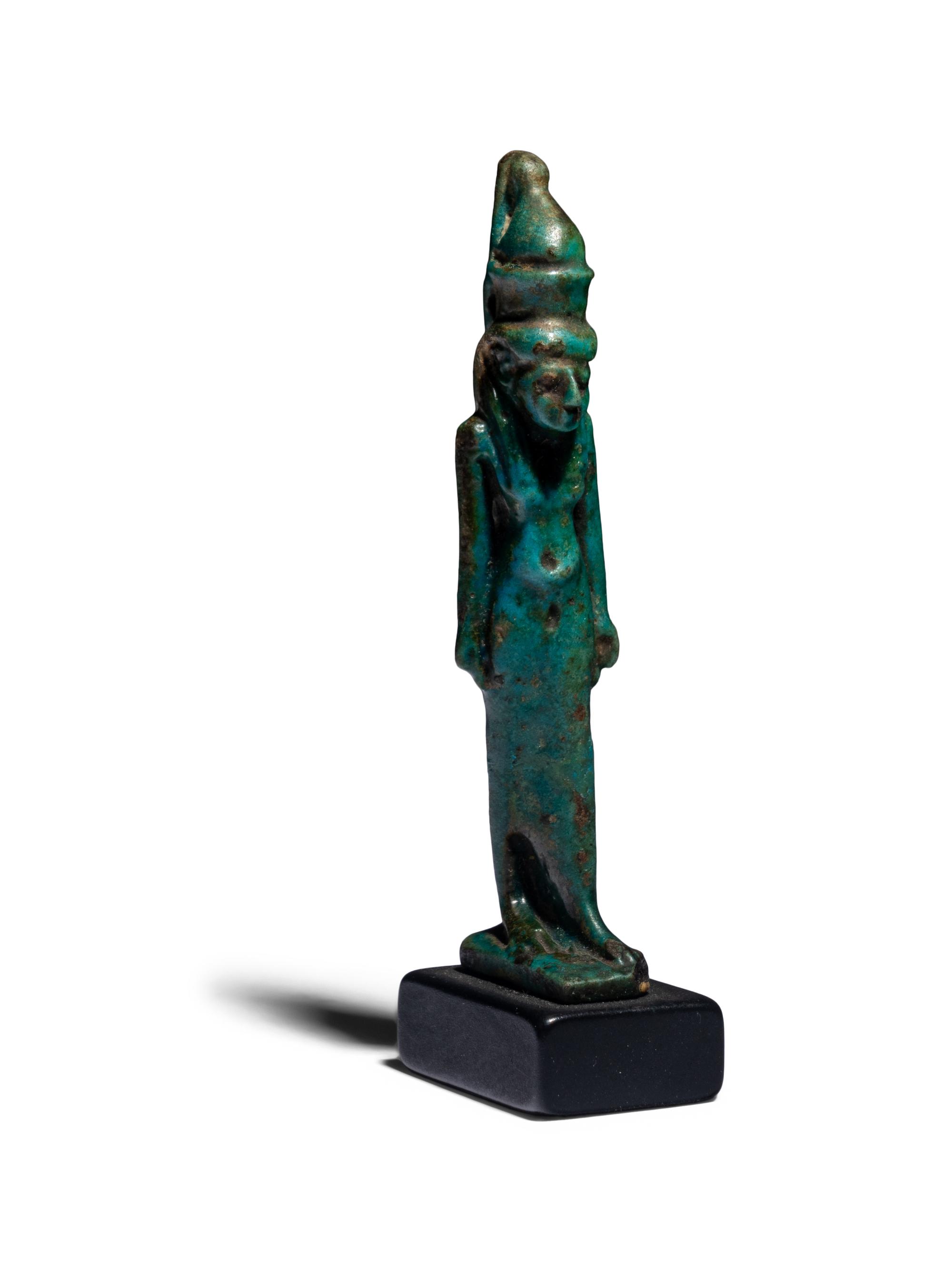 An Egyptian Faience Mut Amulet