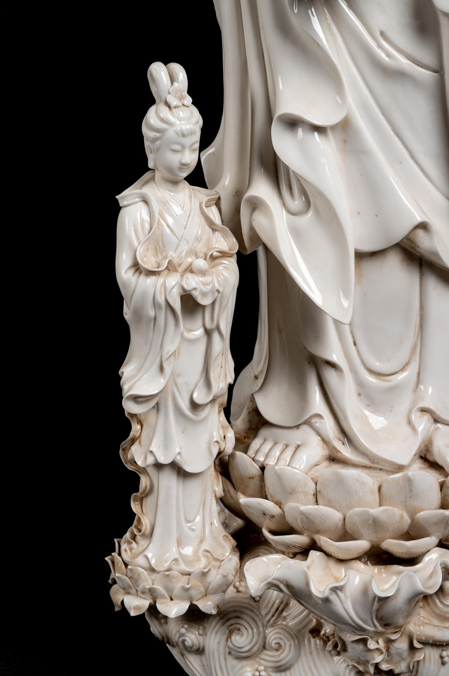 A Monumental Chinese Blanc-de-Chine Porcelain Guanyin Figural Group