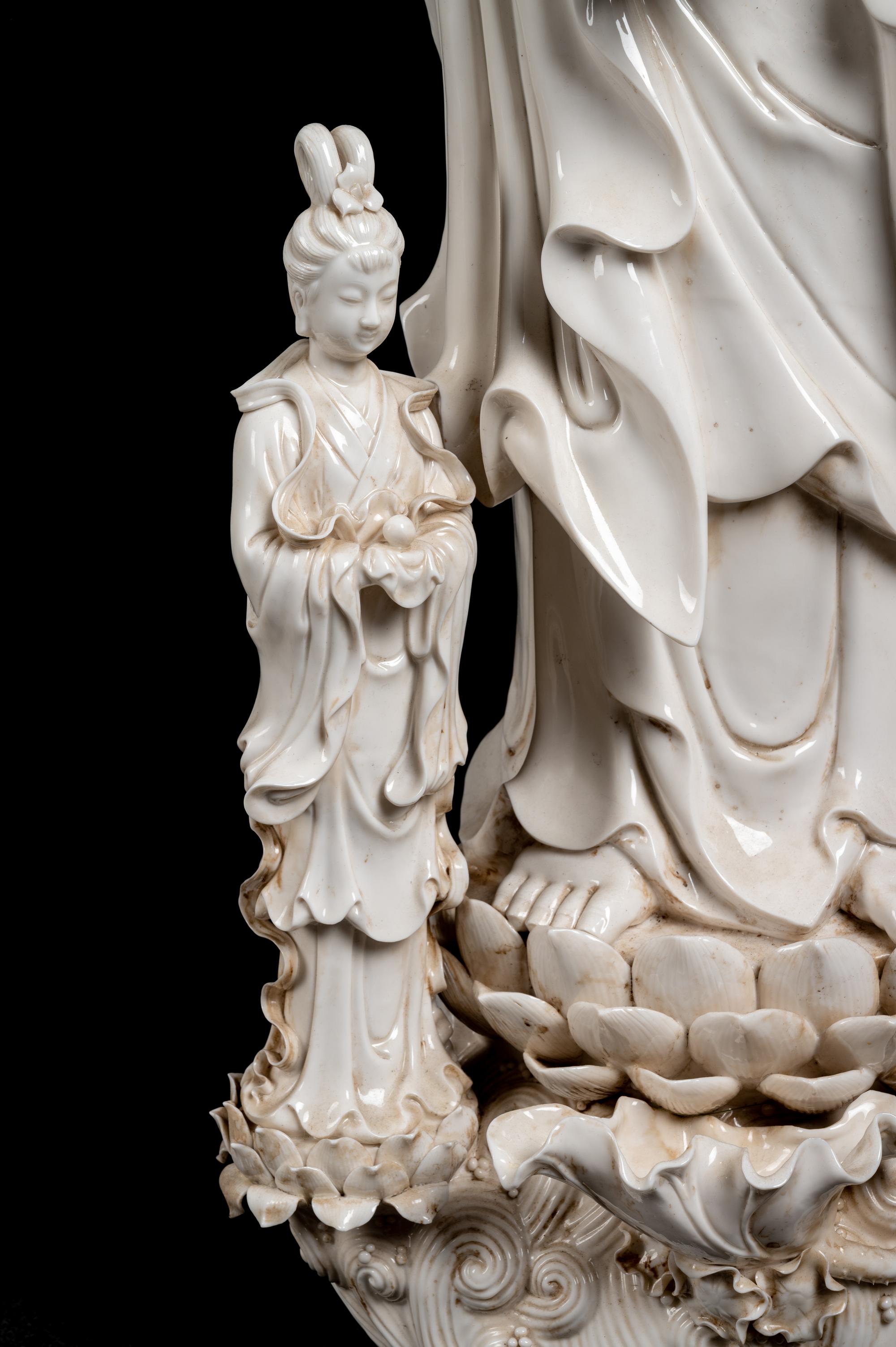 A Monumental Chinese Blanc-de-Chine Porcelain Guanyin Figural Group