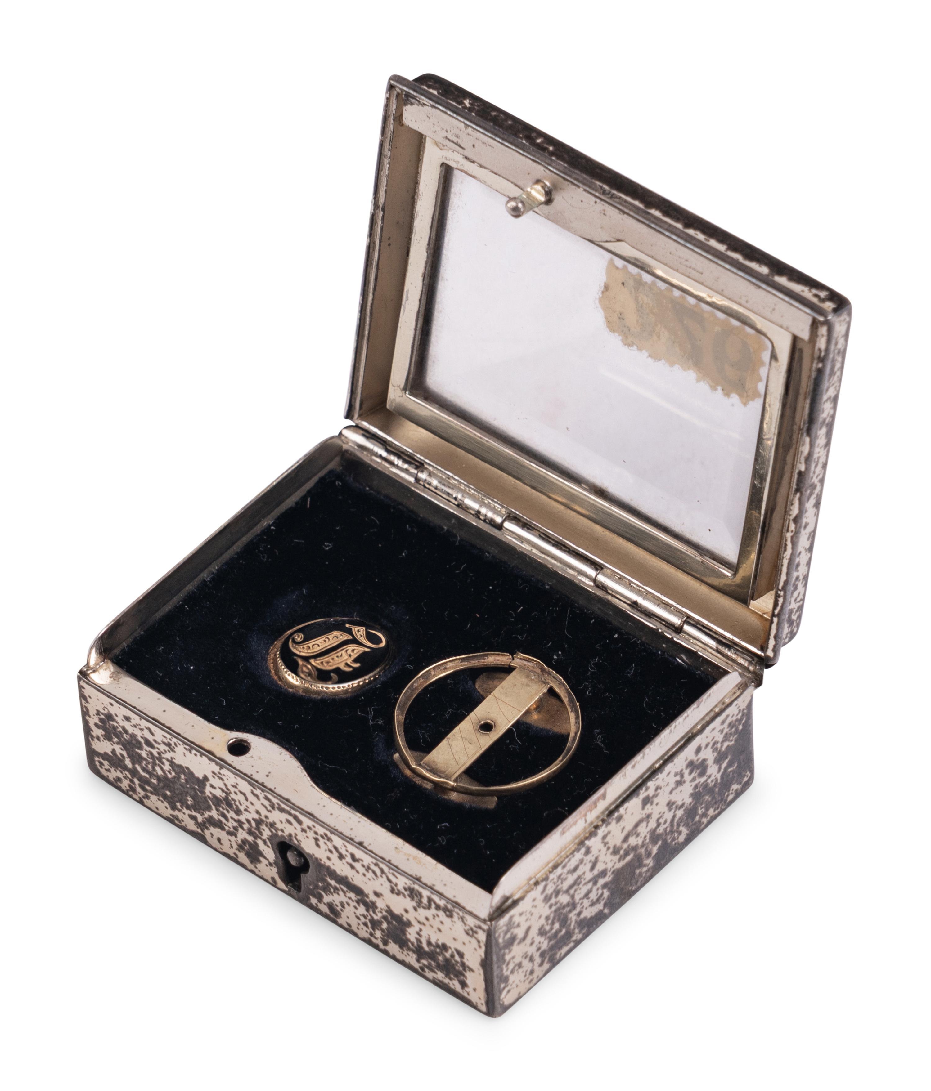 [LINCOLN ASSASSINATION]. A cuff button worn by President Abraham Lincoln on the night of his assassination at Ford's Theatre, 14 April 1865.