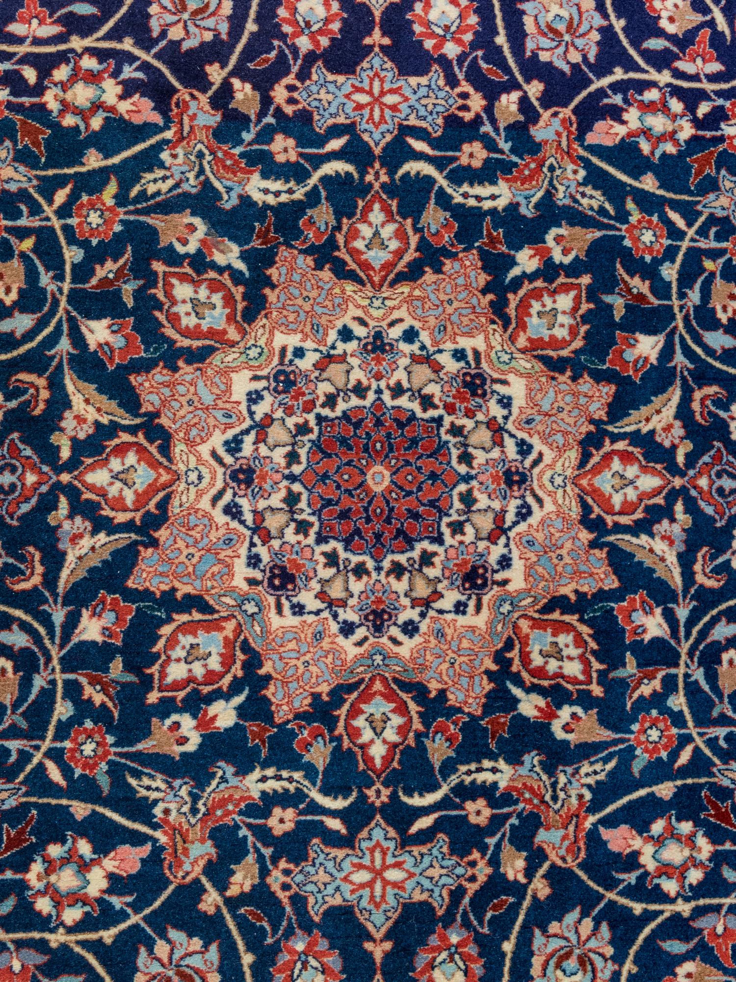A Signed Isfahan Silk Rug