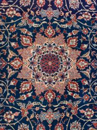 A Signed Isfahan Silk Rug