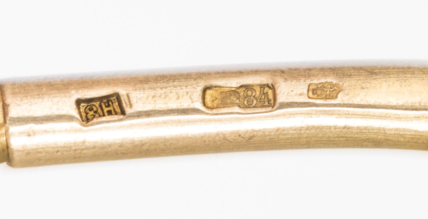 A Russian Silver and Enamel Spoon, Mark of Nikolai Zverev, Moscow, late 19th century, having an enameled finial surmounting an enamel a