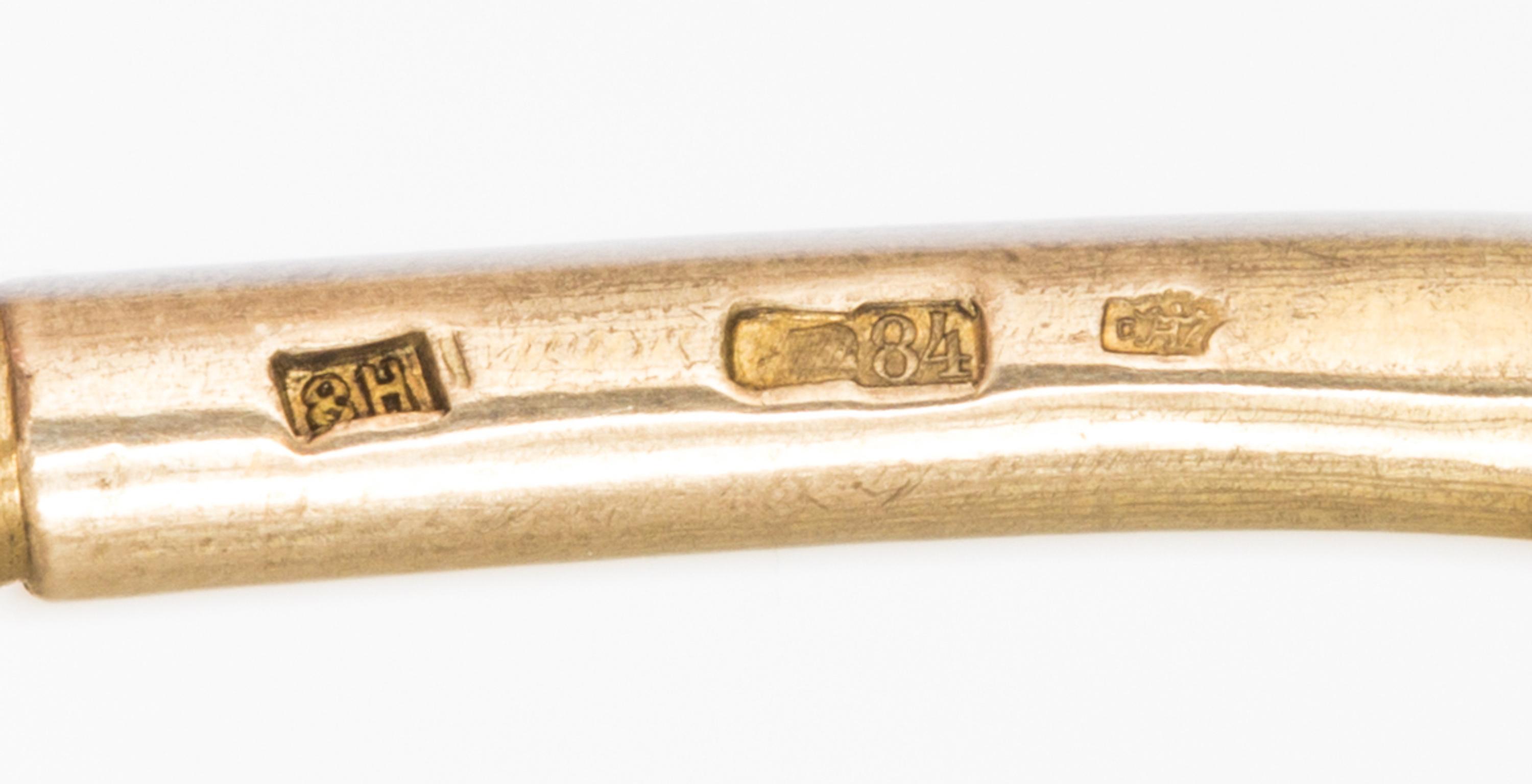 A Russian Silver and Enamel Spoon, Mark of Nikolai Zverev, Moscow, late 19th century, having an enameled finial surmounting an enamel a