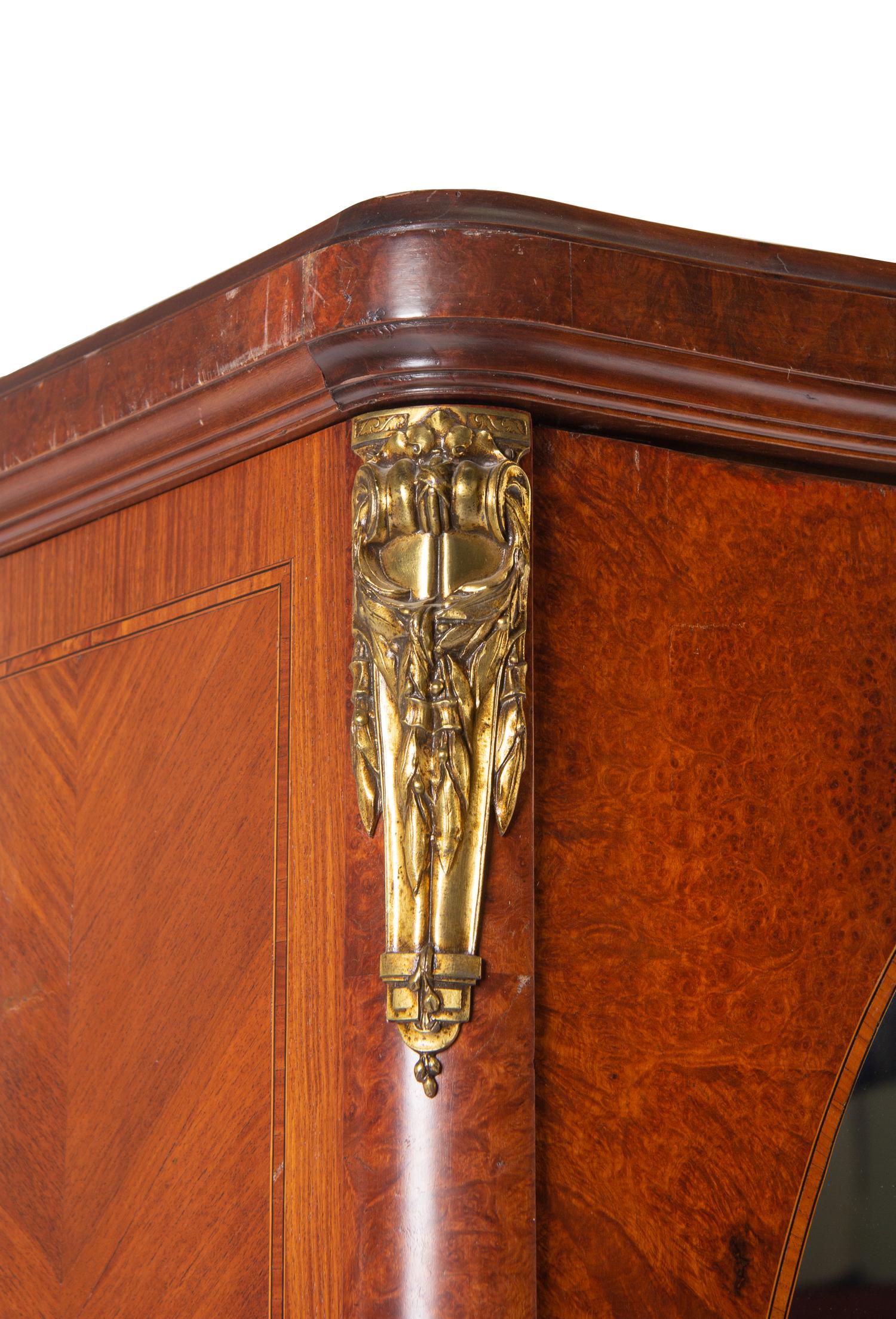 A French Gilt Bronze Mounted Burlwood and Kingwood Armoire