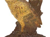 A Painted Cast Iron Owl Doorstop