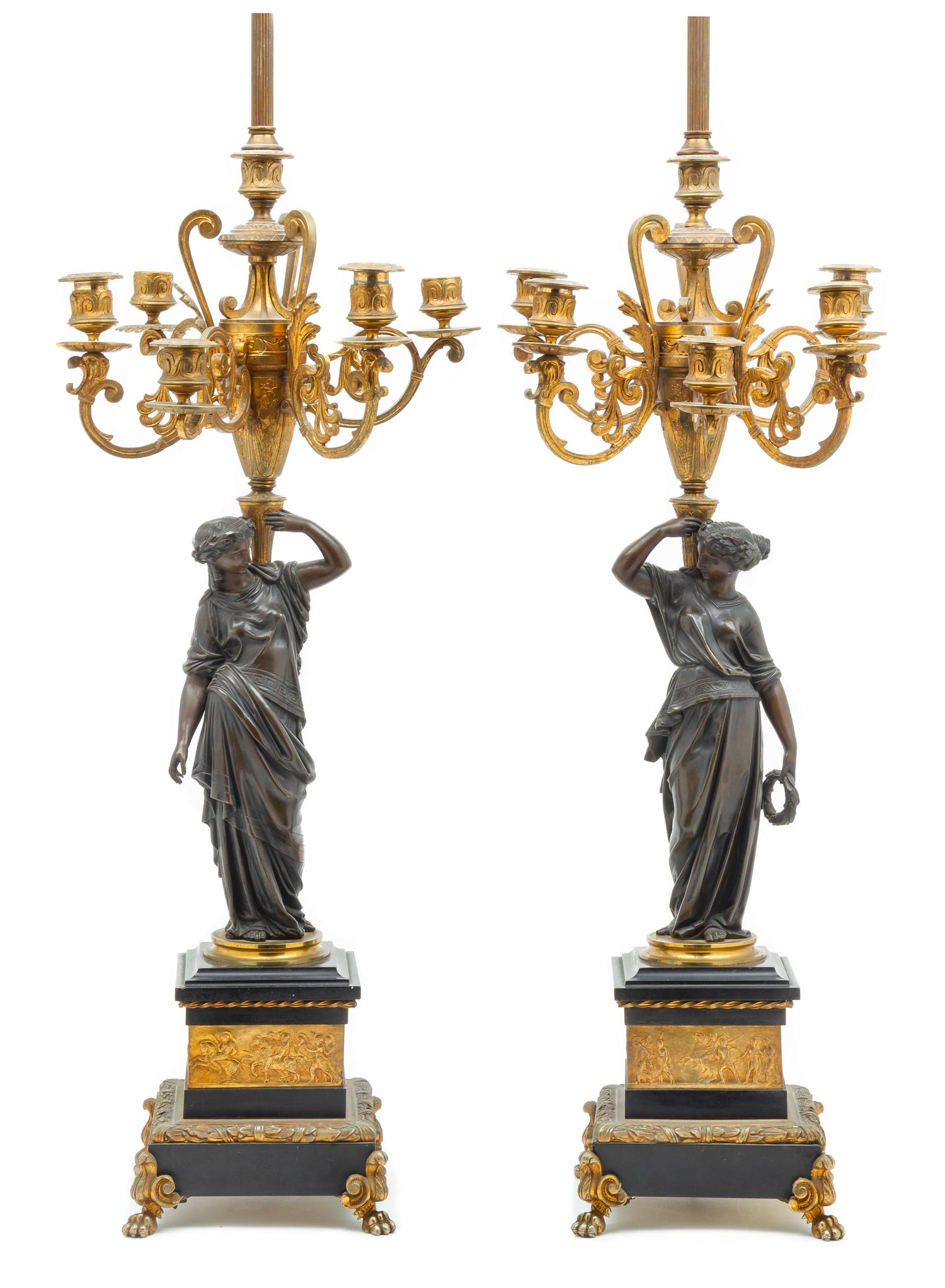 A Pair of Continental Gilt and Patinated Bronze Figural Candelabra Height 42 1/2 inches. — LATE 19TH CENTURY