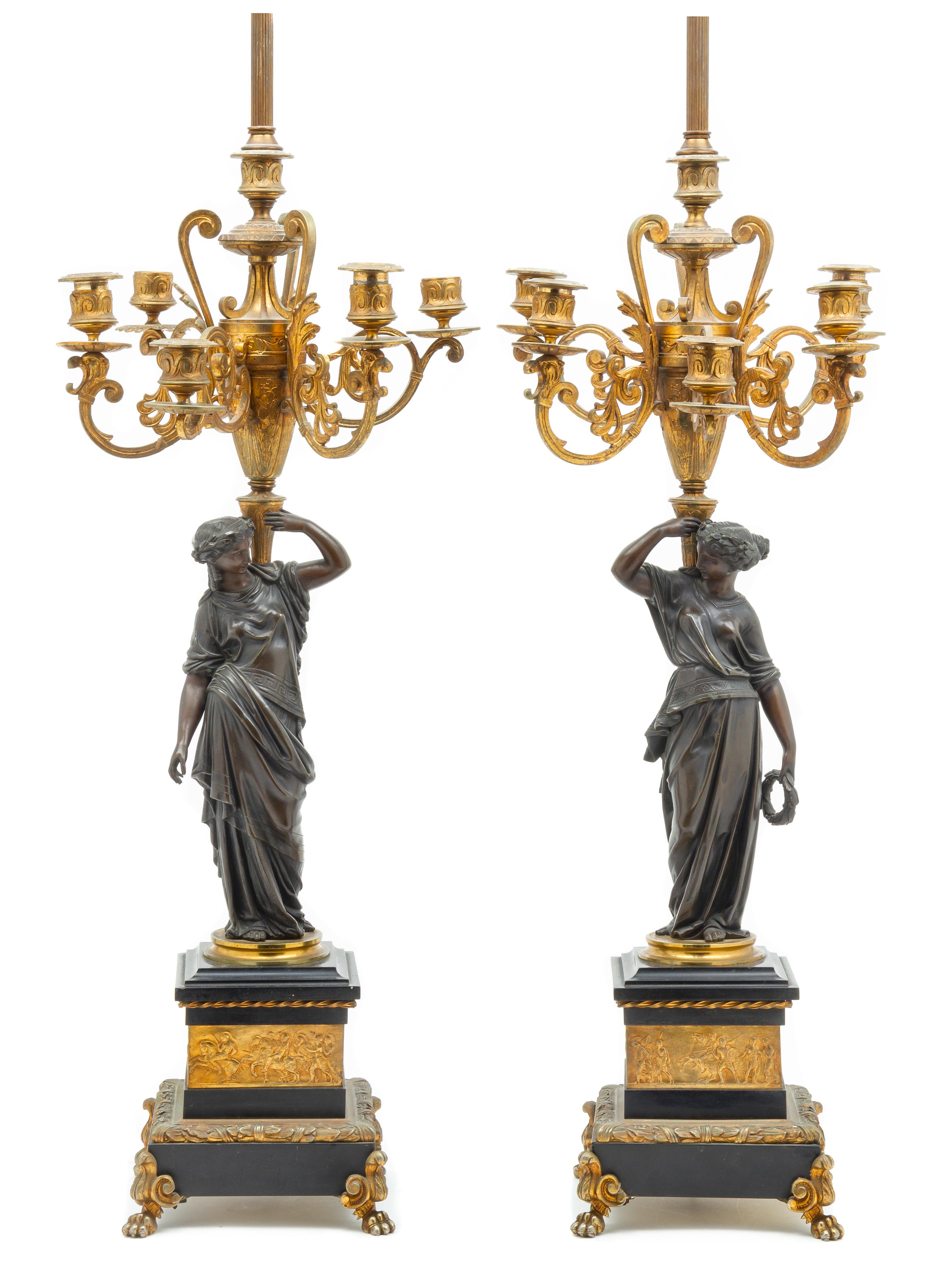A Pair of Continental Gilt and Patinated Bronze Figural Candelabra Height 42 1/2 inches. — LATE 19TH CENTURY