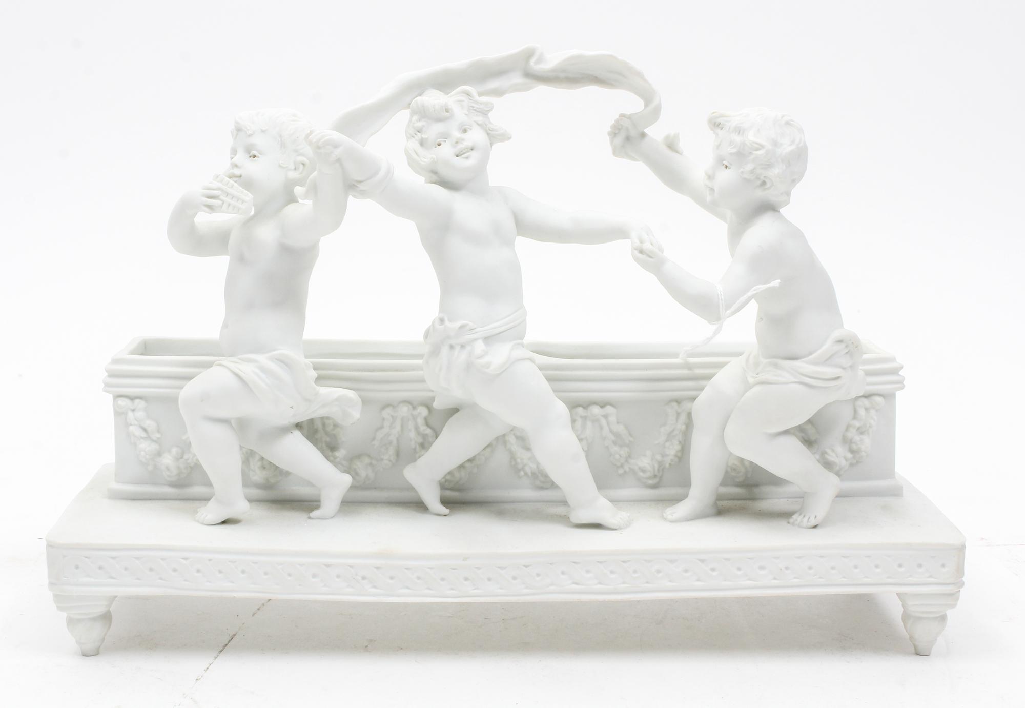 A Continental Bisque Porcelain Jardiniere Width 12 3/8 inches.