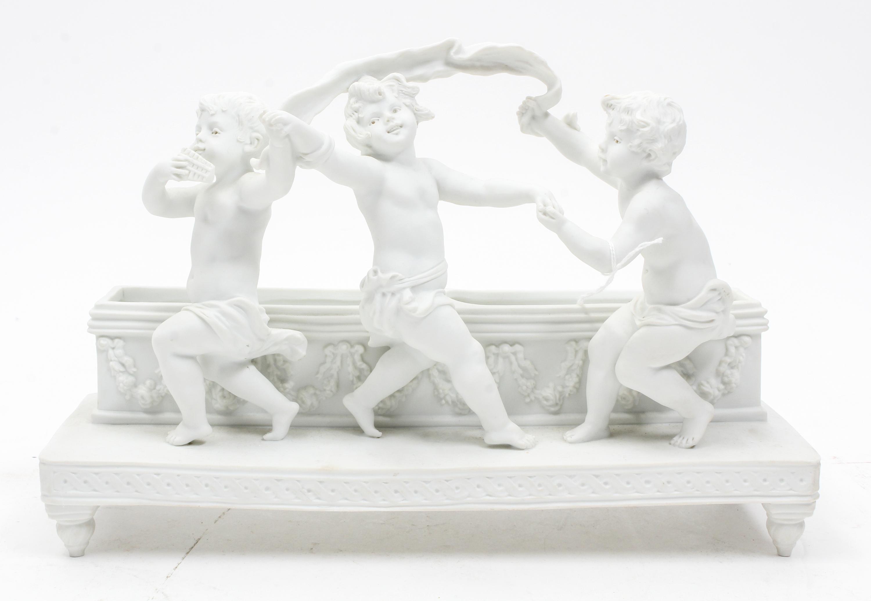 A Continental Bisque Porcelain Jardiniere Width 12 3/8 inches.