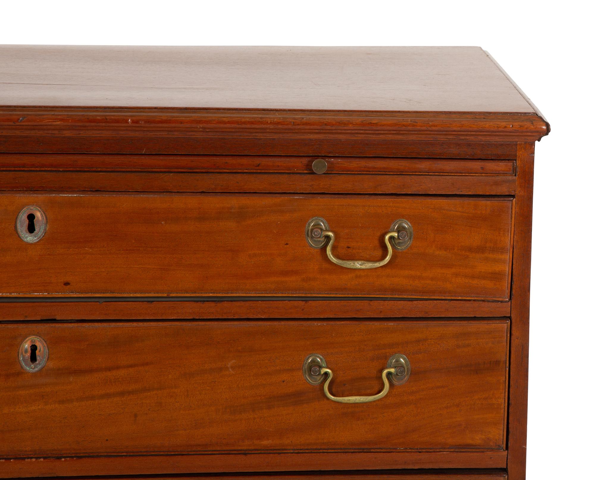 A George III Style Mahogany Bachelor's Chest with Pull-out Slide