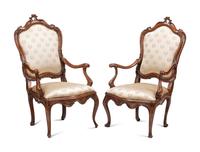 A Pair of Venetian Carved Walnut Armchairs