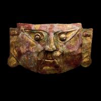 A Chimu Metal Mask with Red Pigment