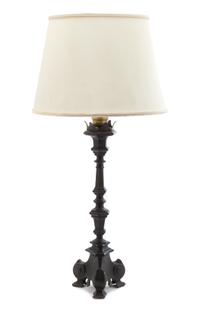 A Baroque Style Patinated Metal Pricket Stick Height overall 25 inches. — 19TH CENTURY