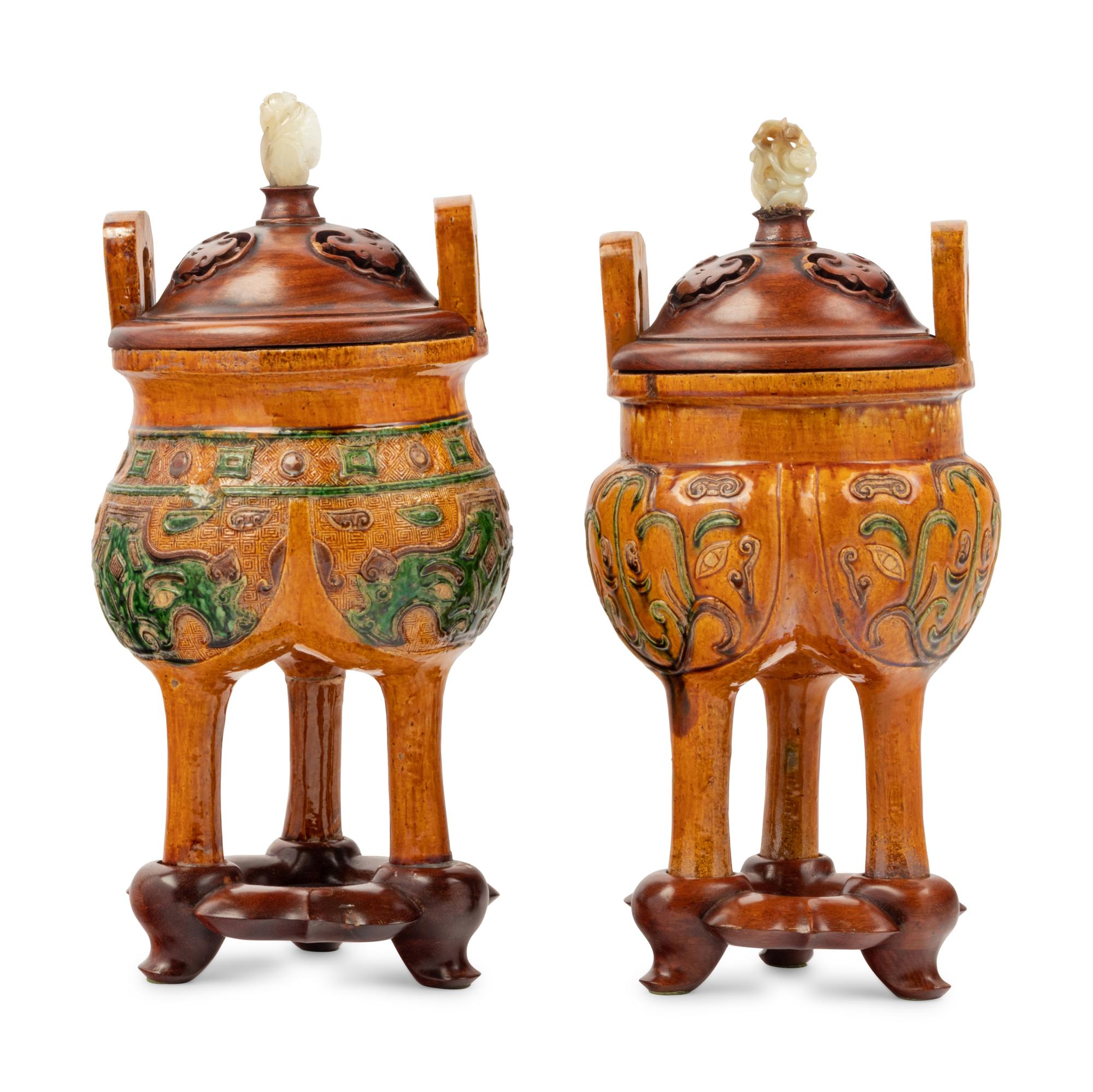 A Pair of Chinese Sancai Glazed Porcelain Tripod Ding Vessels