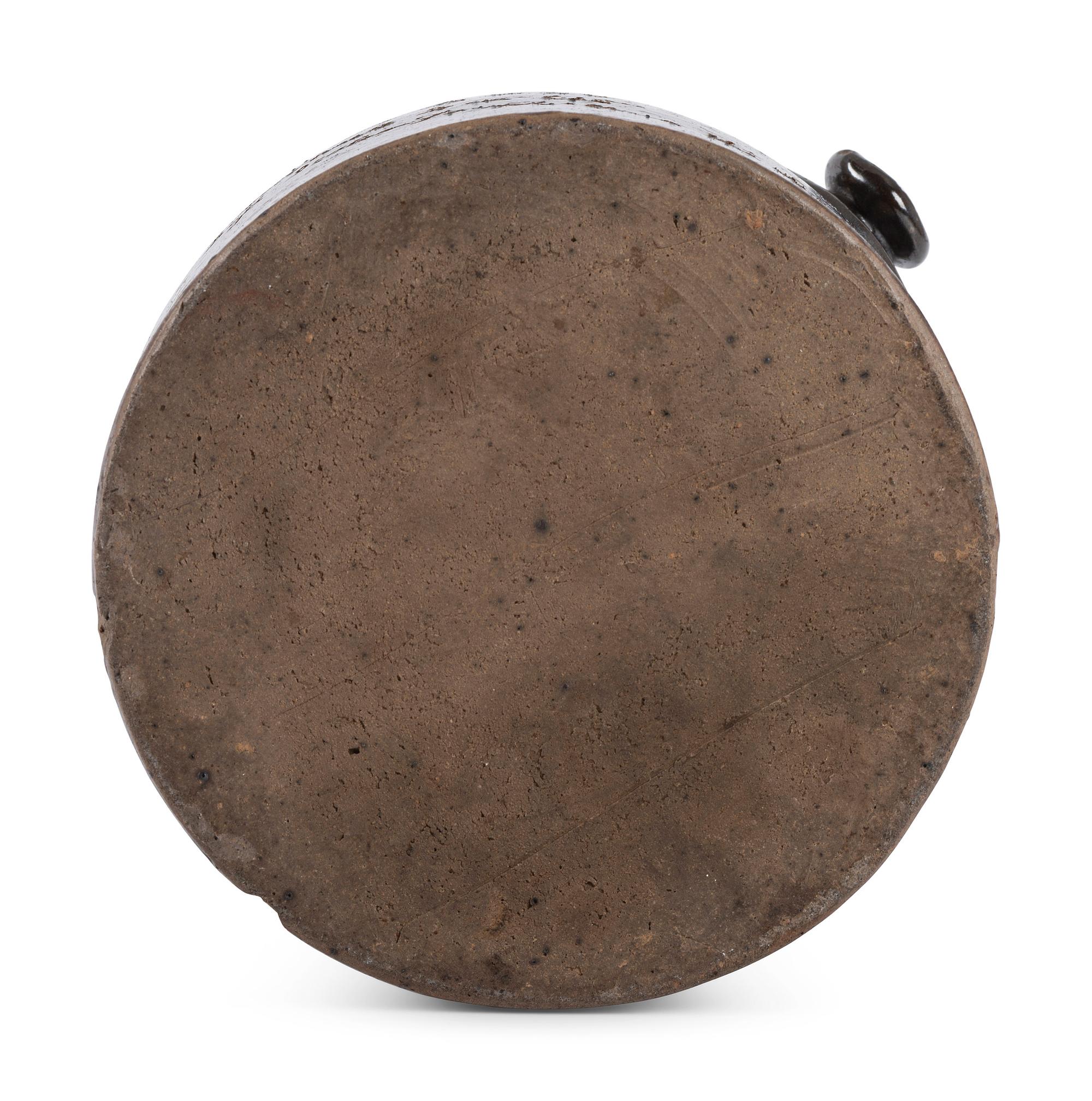 A Scrafitto Incised Albany Slip Stoneware Harvest Jug