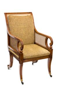 A Regency Style Painted Satinwood Library Chair Height 42 3/4 inches.