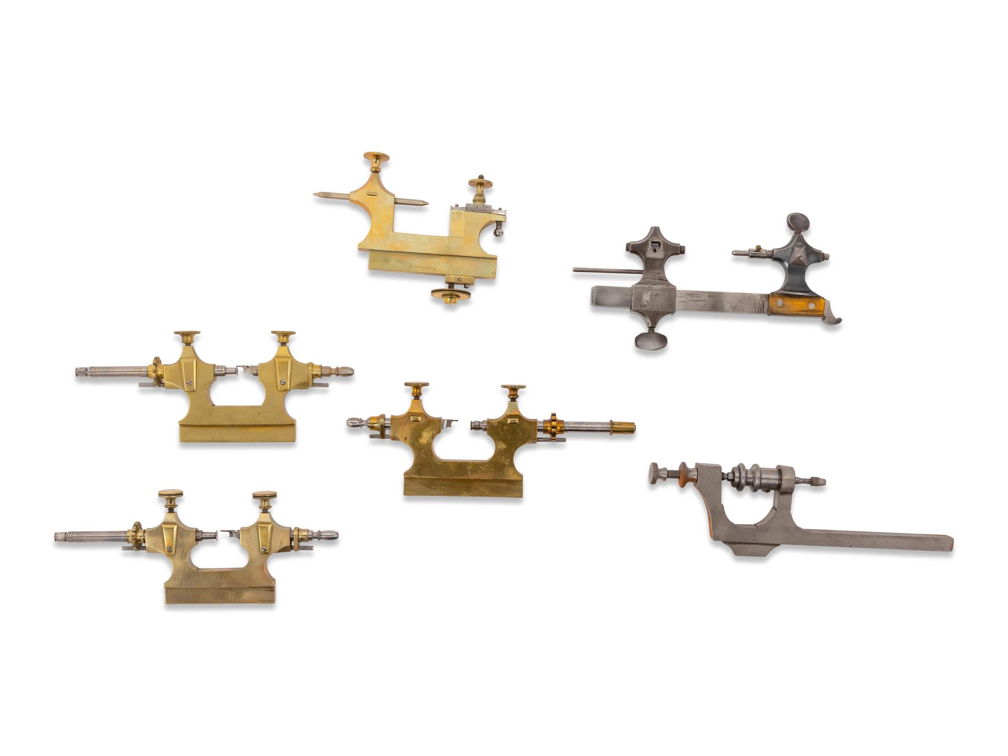 A Collection of Watch Maker's Tools and Lathe Accessories