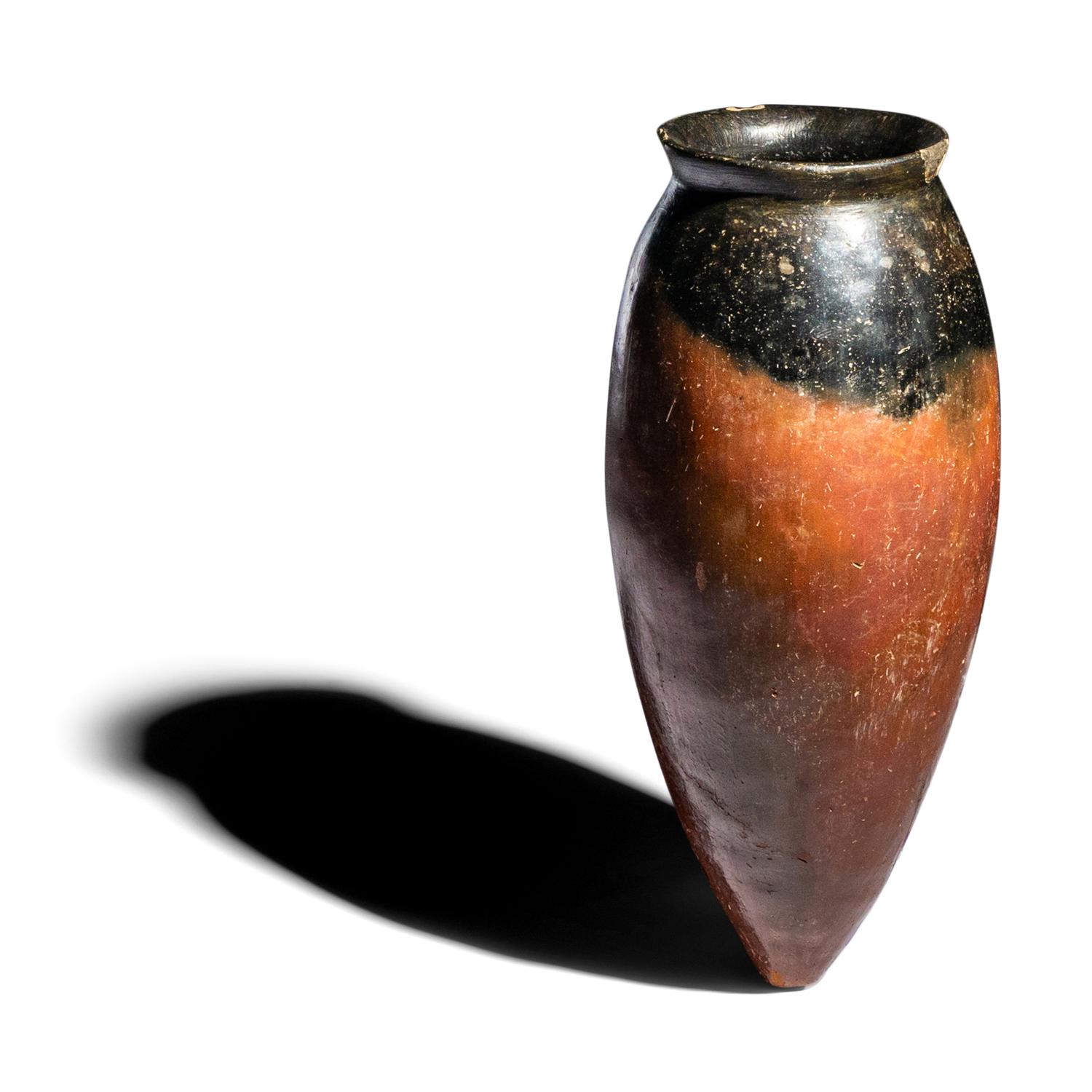 An Egyptian Black-Topped Redware Jar