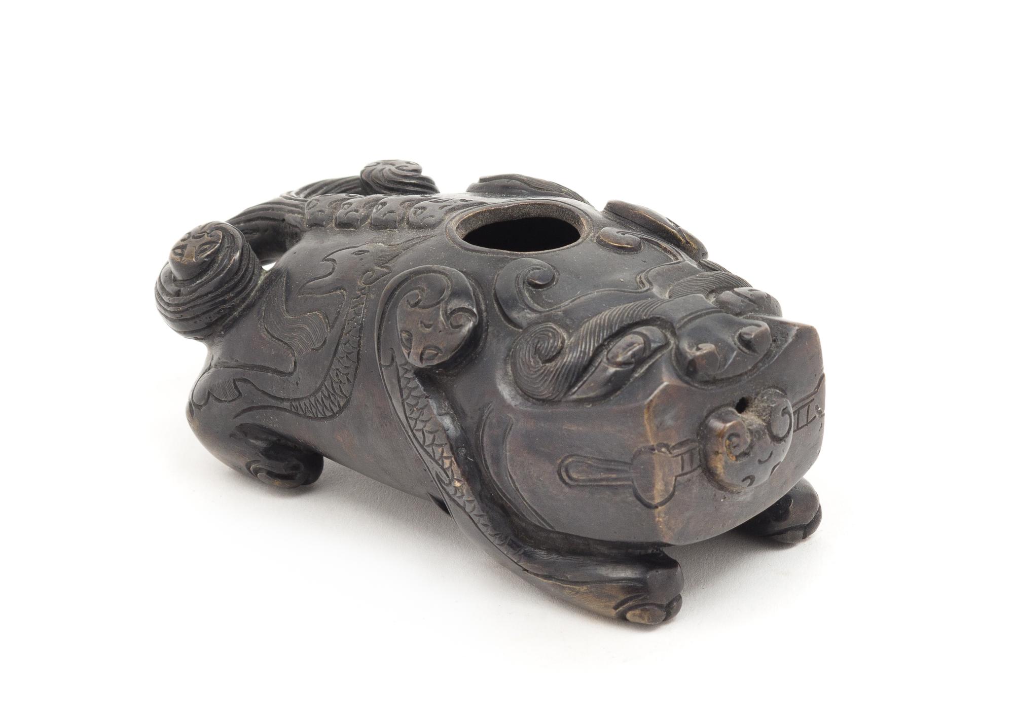 A Bronze Mythical Beast-Form Water Dropper Length 4 1/2 inches.