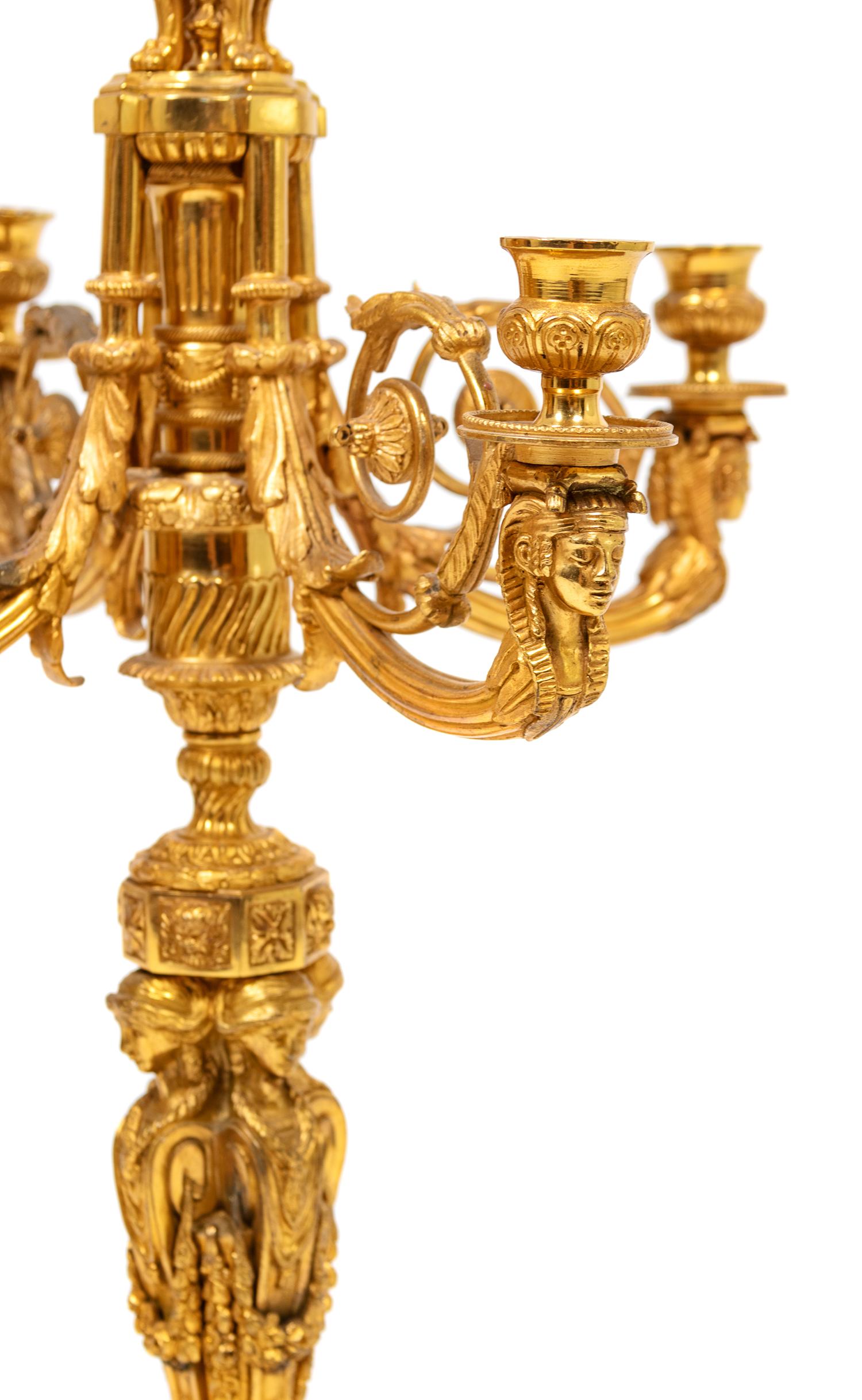 A Pair of Louis XVI Style Gilt-Bronze Four-Light Candelabra