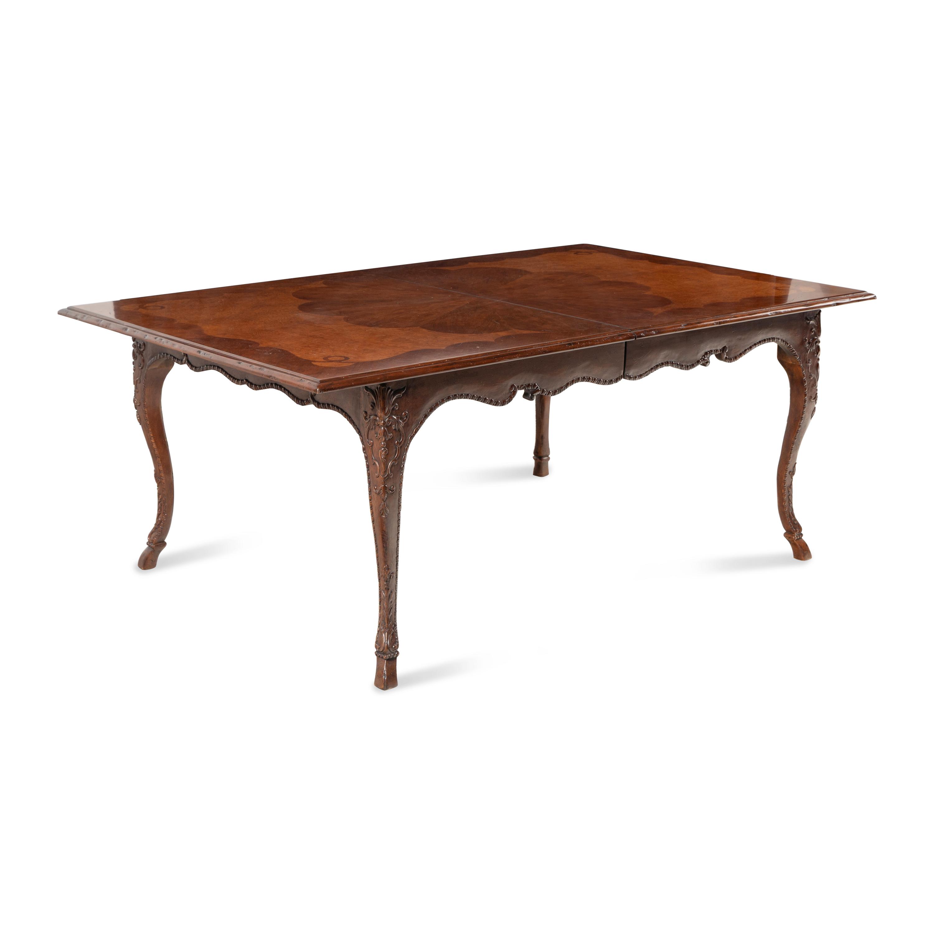 A Baker Mahogany and Burl Walnut Dining Table