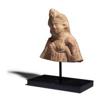 An Egyptian Terracotta Bust of Isis