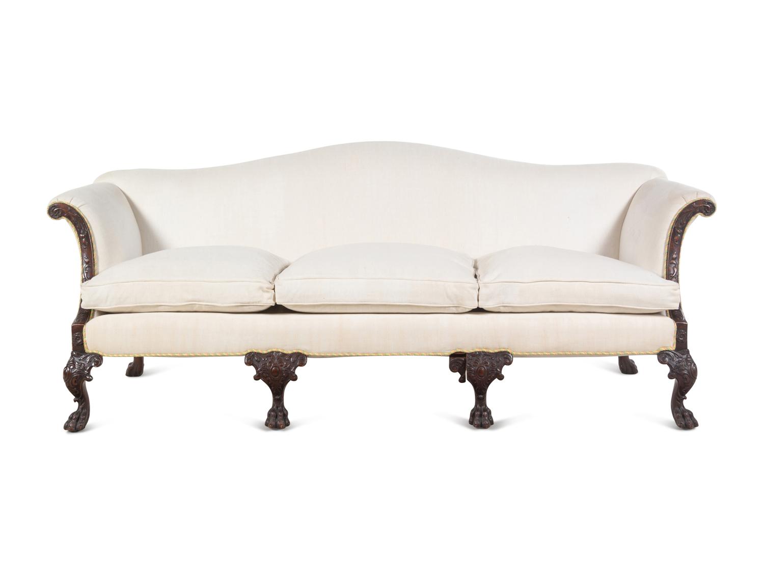 A George I Style Carved Mahogany Camelback Sofa